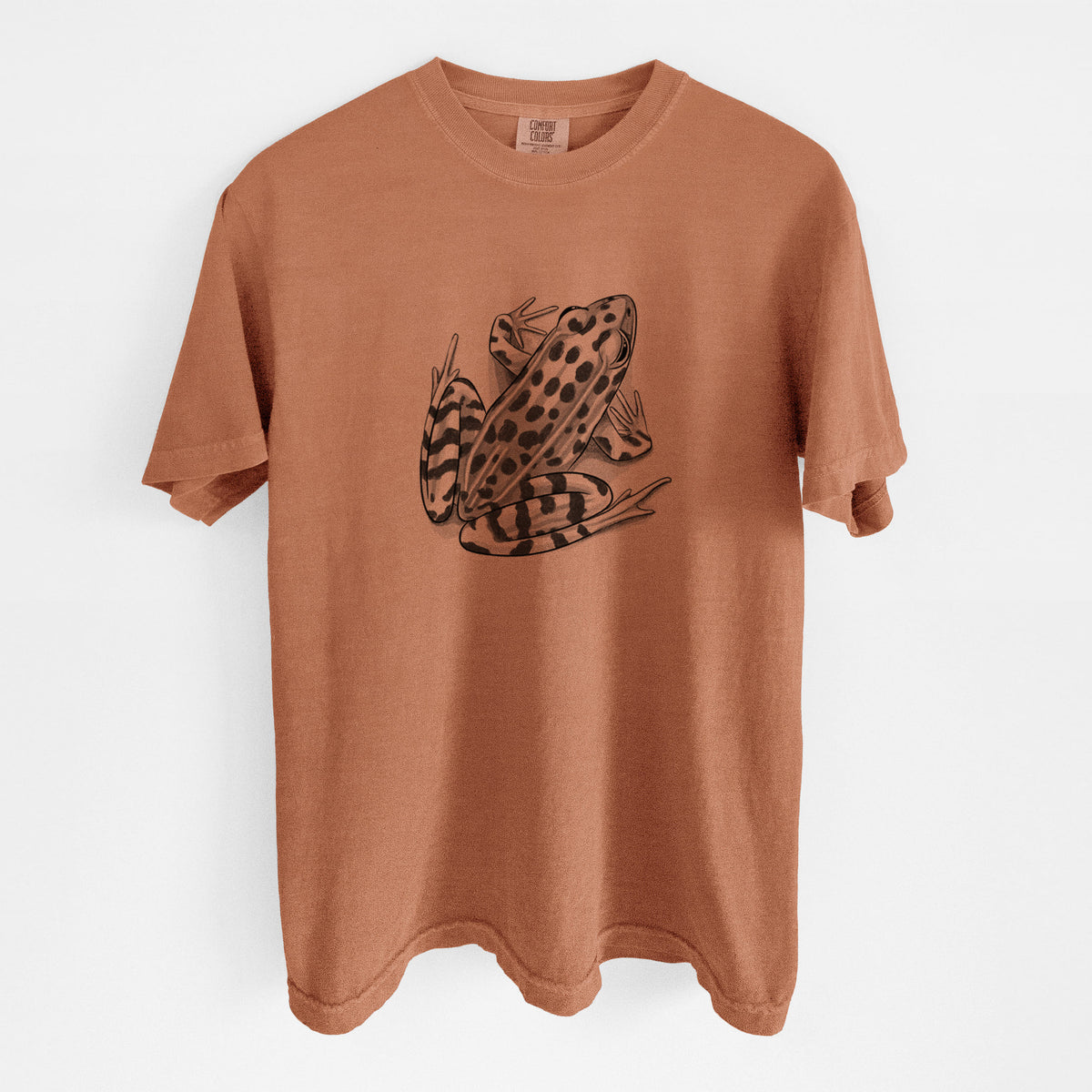 Yam burnt orange Comfort Colors t-shirt laid flat, printed with a detailed black ink illustration of a spotted northern leopard frog.