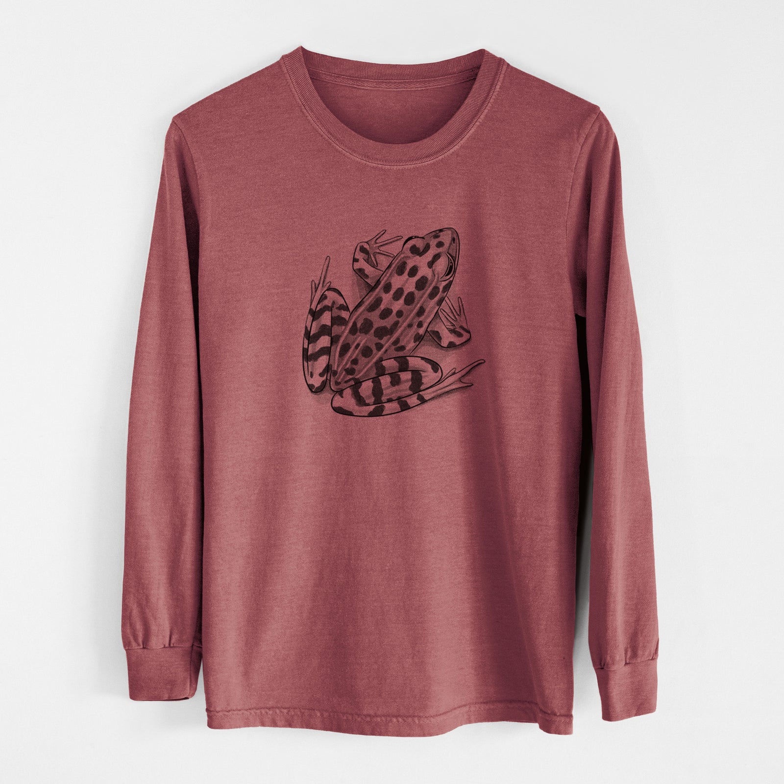 Ivory Comfort Colors long sleeve shirt laid flat, printed with a detailed black ink illustration of a spotted northern leopard frog.
