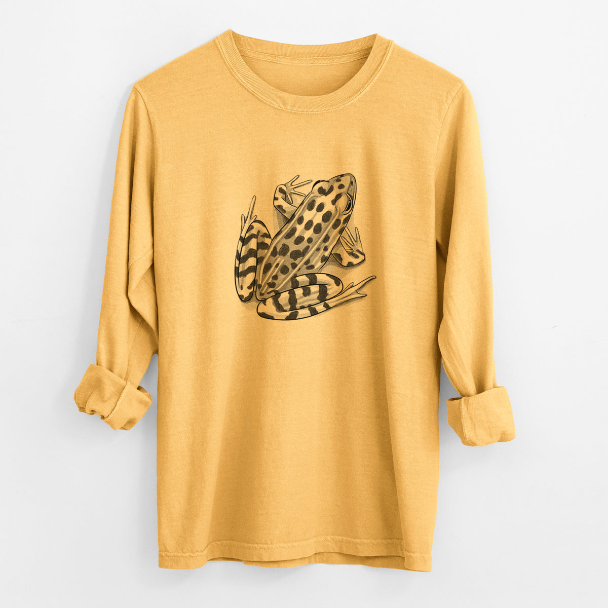Golden wheat yellow Comfort Colors long sleeve shirt laid flat with the cuffs rolled, printed with a detailed black ink illustration of a spotted northern leopard frog.