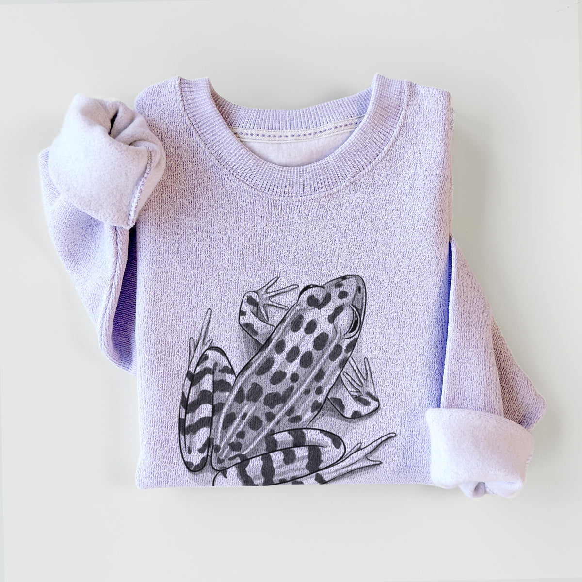 Ice purple knit sweatshirt printed with a detailed black ink illustration of a spotted northern leopard frog, styled flat.