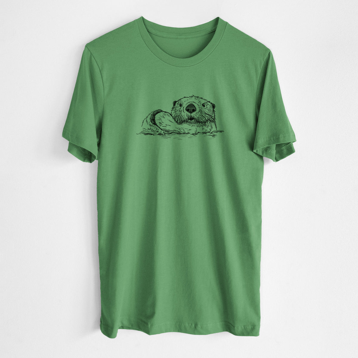 Leaf green lightweight cotton t-shirt laid flat, printed with a black ink illustration of a northern river otter peeking out of the water.