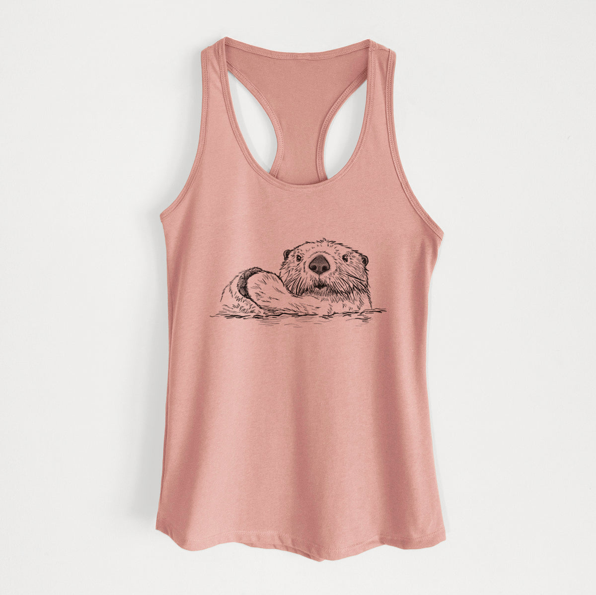 Desert pink women's racerback tank top laid flat, printed with a black ink illustration of a northern river otter peeking out of the water.