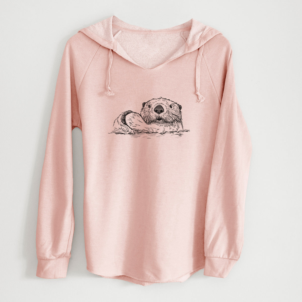 Blush pink women's Cali Wave hooded sweatshirt laid flat, printed with a black ink illustration of a northern river otter peeking out of the water.