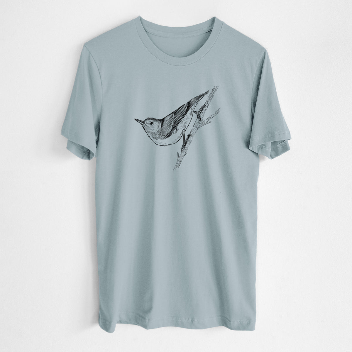 Vintage denim lightweight cotton t-shirt laid flat, printed with a detailed black ink sketch of a nuthatch clinging to a branch.