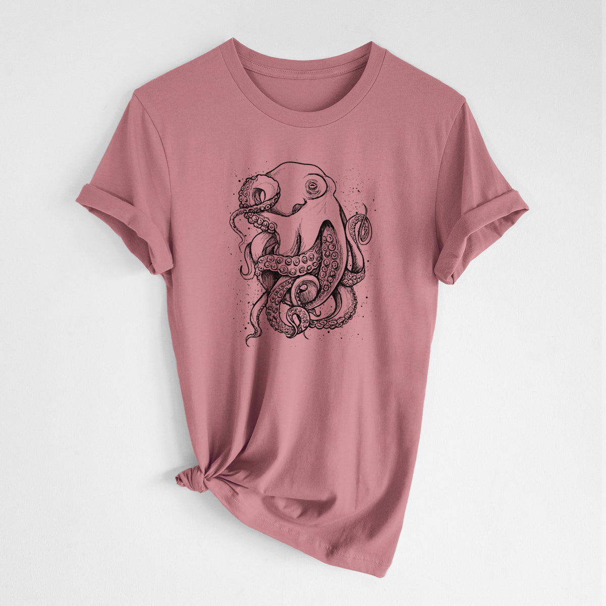 Mauve pink lightweight cotton t-shirt laid flat with the sleeves rolled, printed with a detailed black ink illustration of a common octopus with curling tentacles.