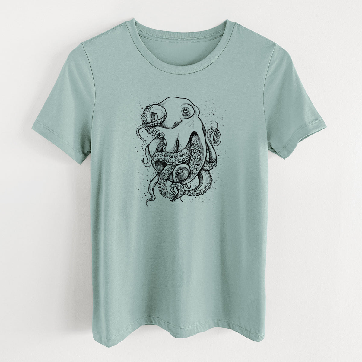 Dusty blue women's relaxed fit cotton t-shirt laid flat, printed with a detailed black ink illustration of a common octopus with curling tentacles.