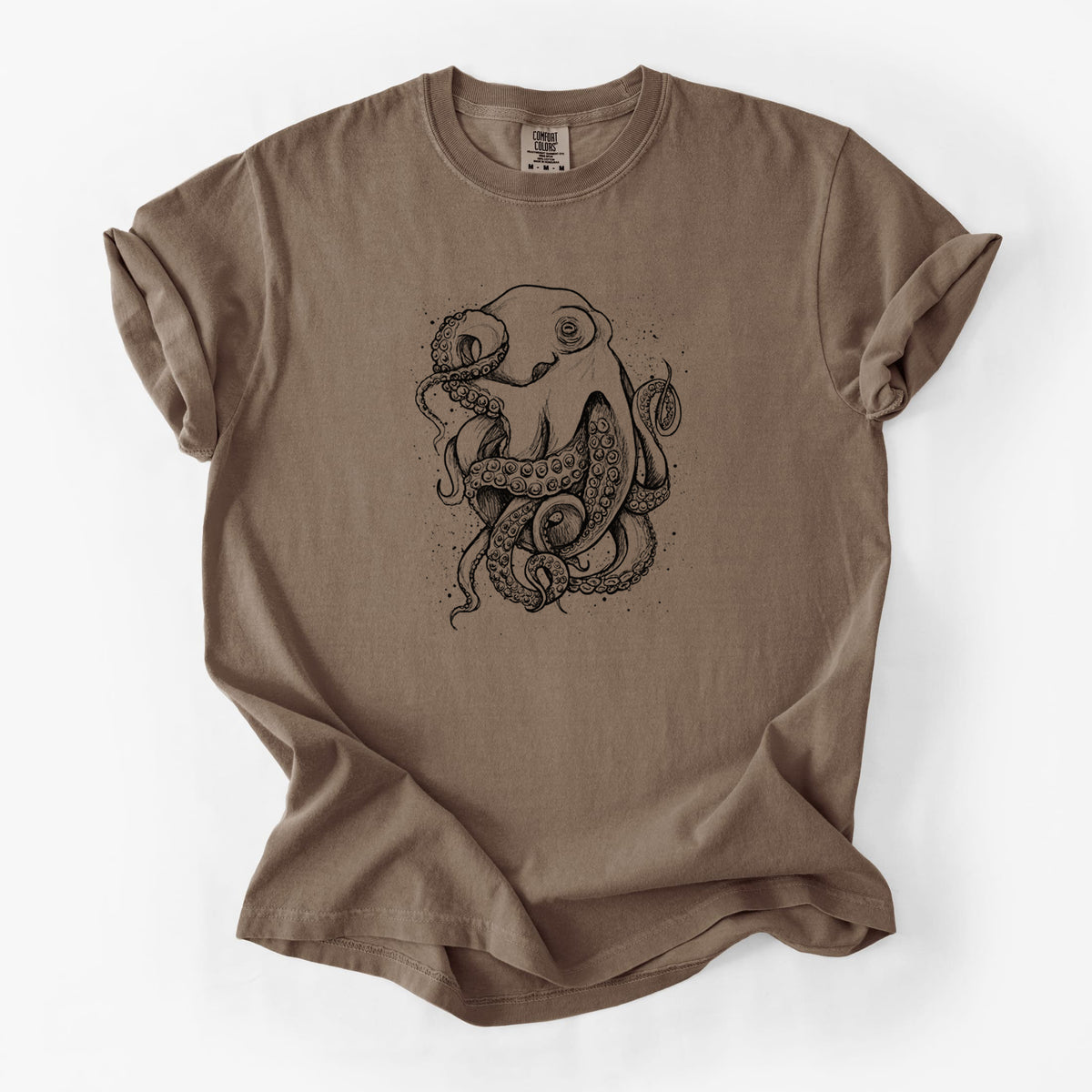 Espresso brown Comfort Colors t-shirt laid flat, printed with a detailed black ink illustration of a common octopus with curling tentacles.