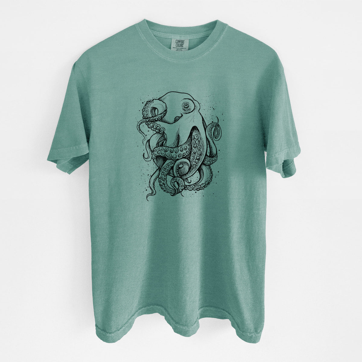 Reef green Comfort Colors t-shirt laid flat, printed with a detailed black ink illustration of a common octopus with curling tentacles.