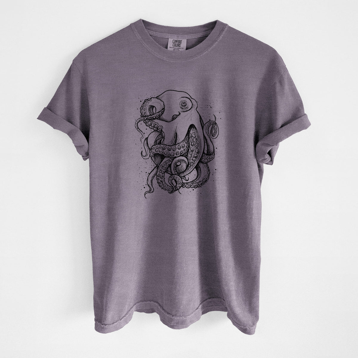 Wine red Comfort Colors t-shirt laid flat, printed with a detailed black ink illustration of a common octopus with curling tentacles.