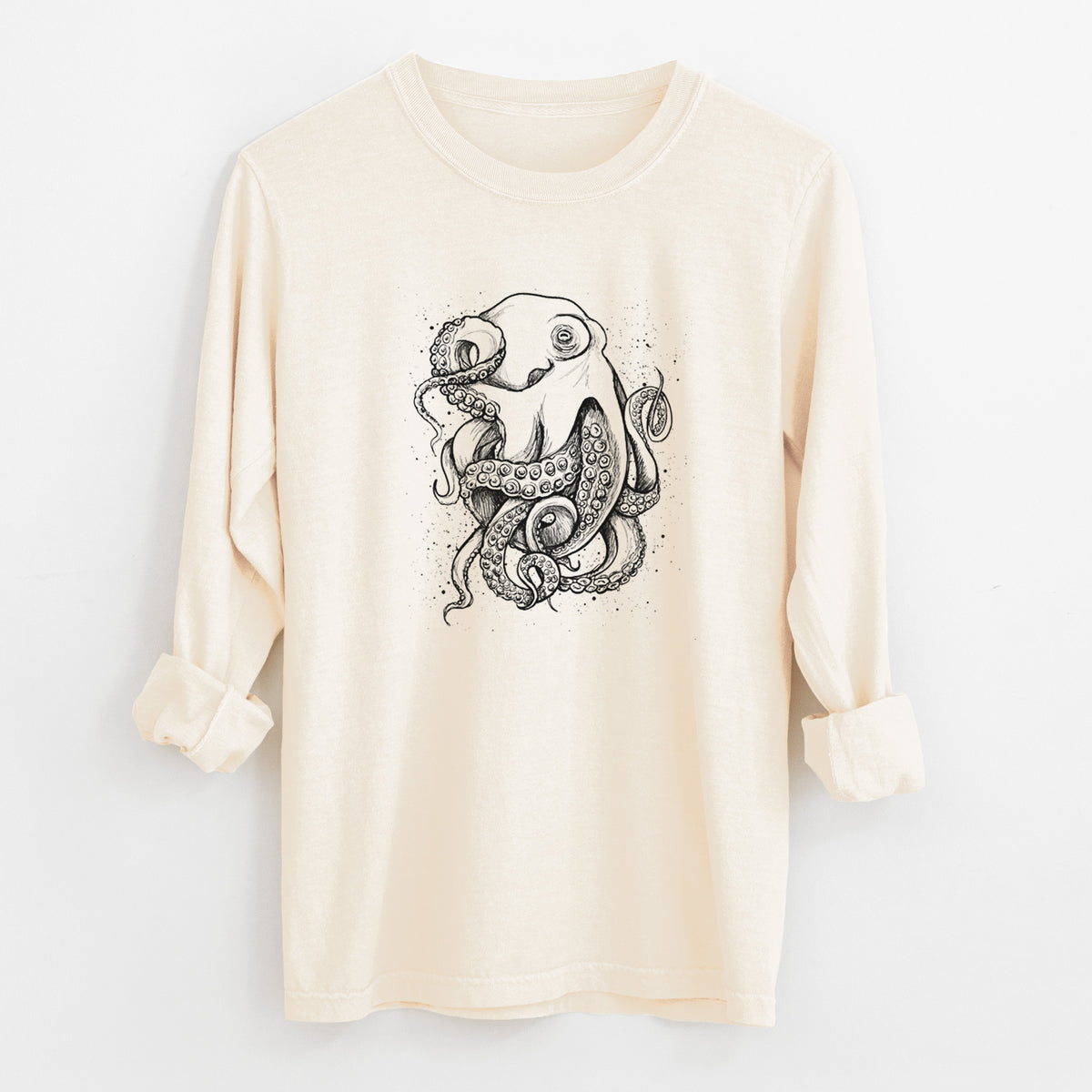 Ivory Comfort Colors long sleeve shirt laid flat with the cuffs rolled, printed with a detailed black ink illustration of a common octopus with curling tentacles.