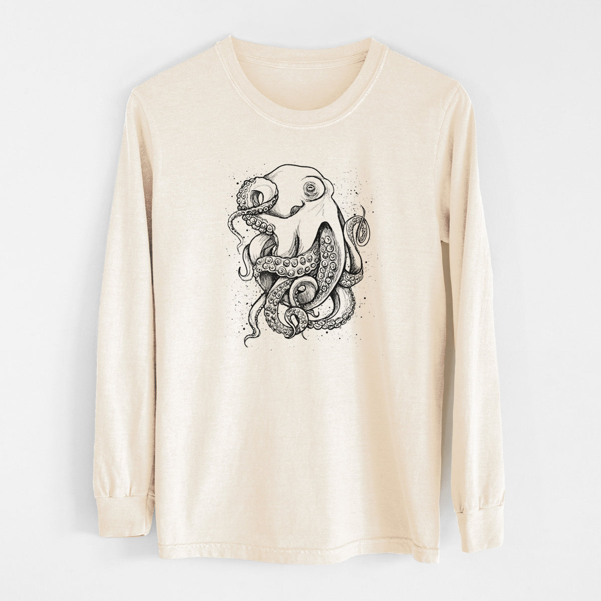 Ivory Comfort Colors long sleeve shirt laid flat, printed with a detailed black ink illustration of a common octopus with curling tentacles.