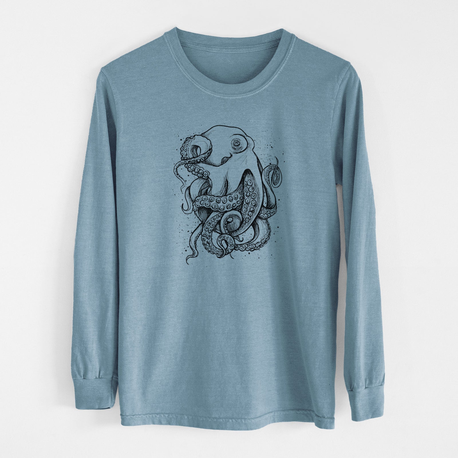 Steel blue Comfort Colors long sleeve shirt laid flat, printed with a detailed black ink illustration of a common octopus with curling tentacles.