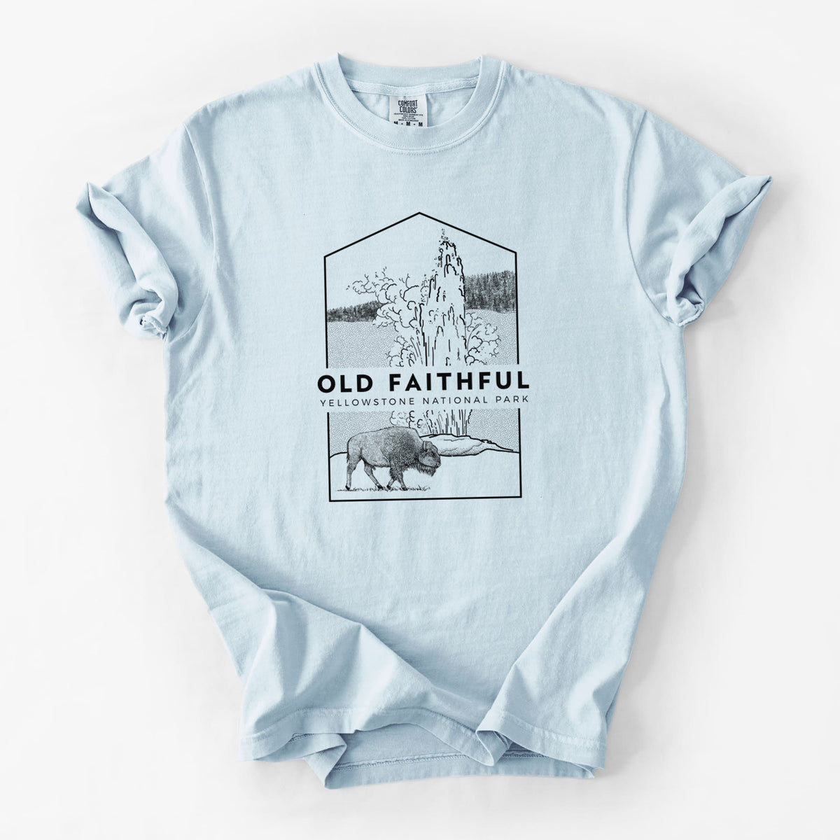 Chambray blue Comfort Colors t-shirt laid flat, printed with a black line art badge of the Old Faithful geyser erupting with a bison nearby, with the words Old Faithful, Yellowstone National Park.