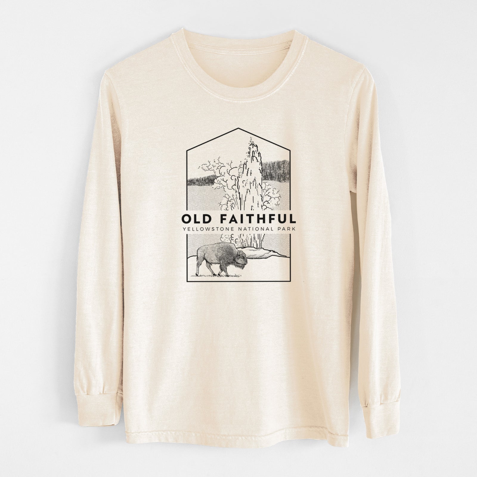 Ivory Comfort Colors long sleeve shirt laid flat, printed with a black line art badge of the Old Faithful geyser erupting with a bison nearby, with the words Old Faithful, Yellowstone National Park.