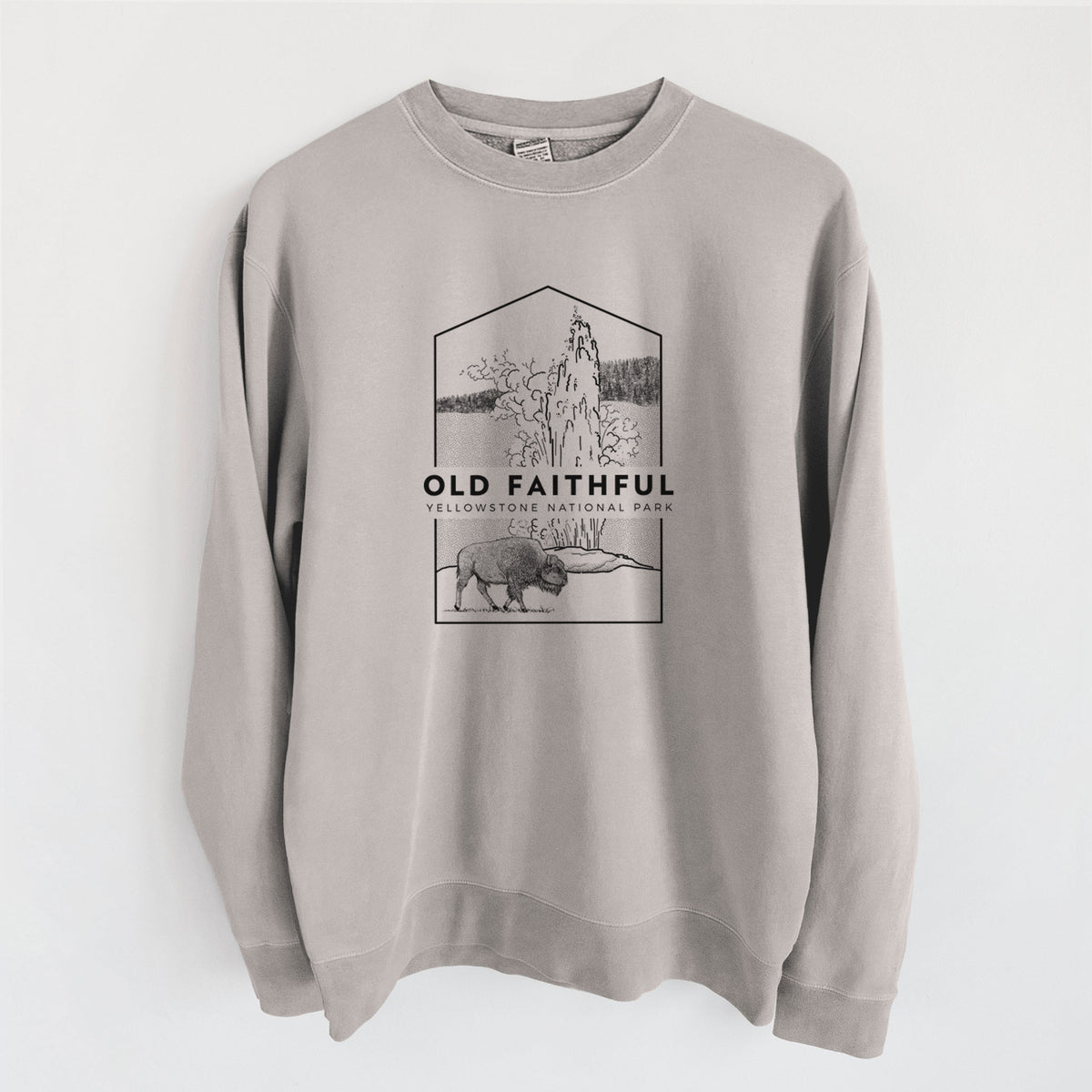 Cement grey pigment dyed crewneck sweatshirt laid flat, printed with a black line art badge of the Old Faithful geyser erupting with a bison nearby, with the words Old Faithful, Yellowstone National Park.