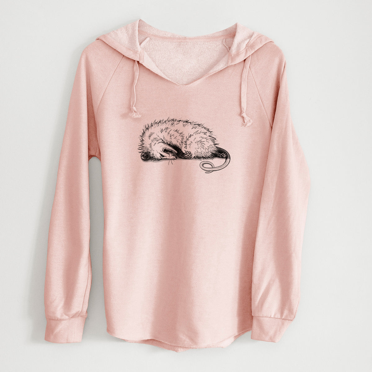 Blush pink women's Cali Wave hooded sweatshirt laid flat, printed with a black ink illustration of an opossum lying on its side playing dead.