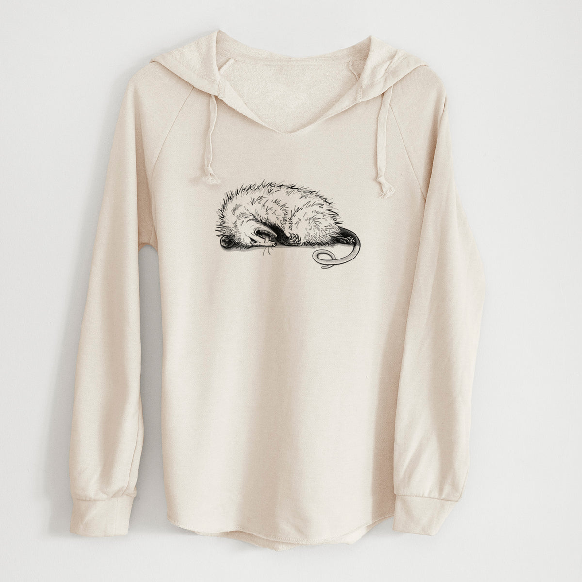 Bone cream women's Cali Wave hooded sweatshirt laid flat, printed with a black ink illustration of an opossum lying on its side playing dead.