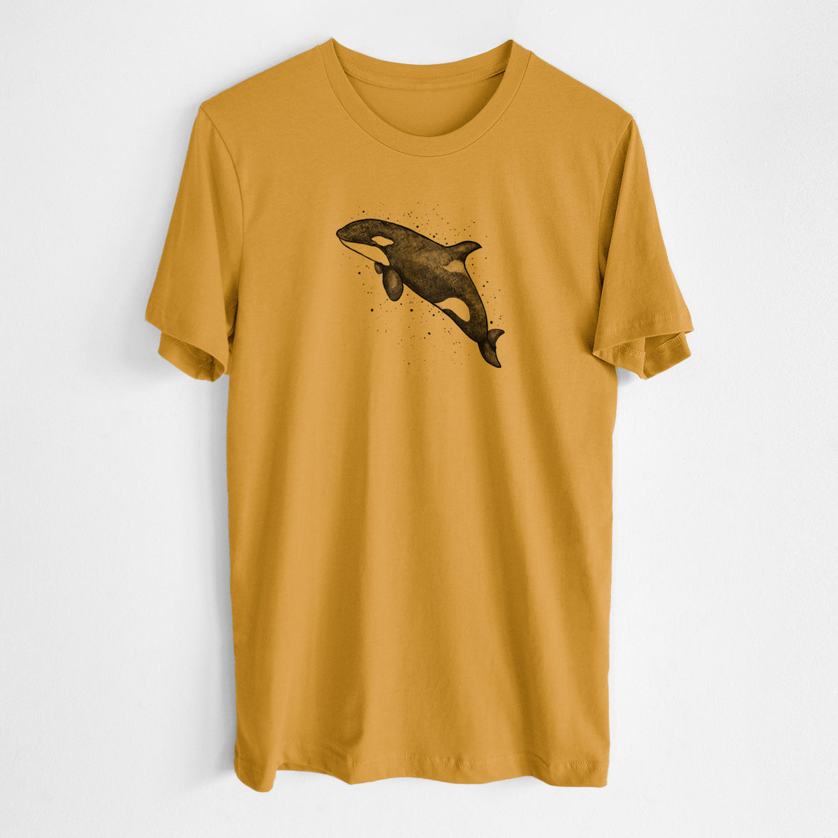 Honeycomb yellow lightweight cotton t-shirt laid flat, printed with a black ink illustration of an orca leaping, with ink splatters.