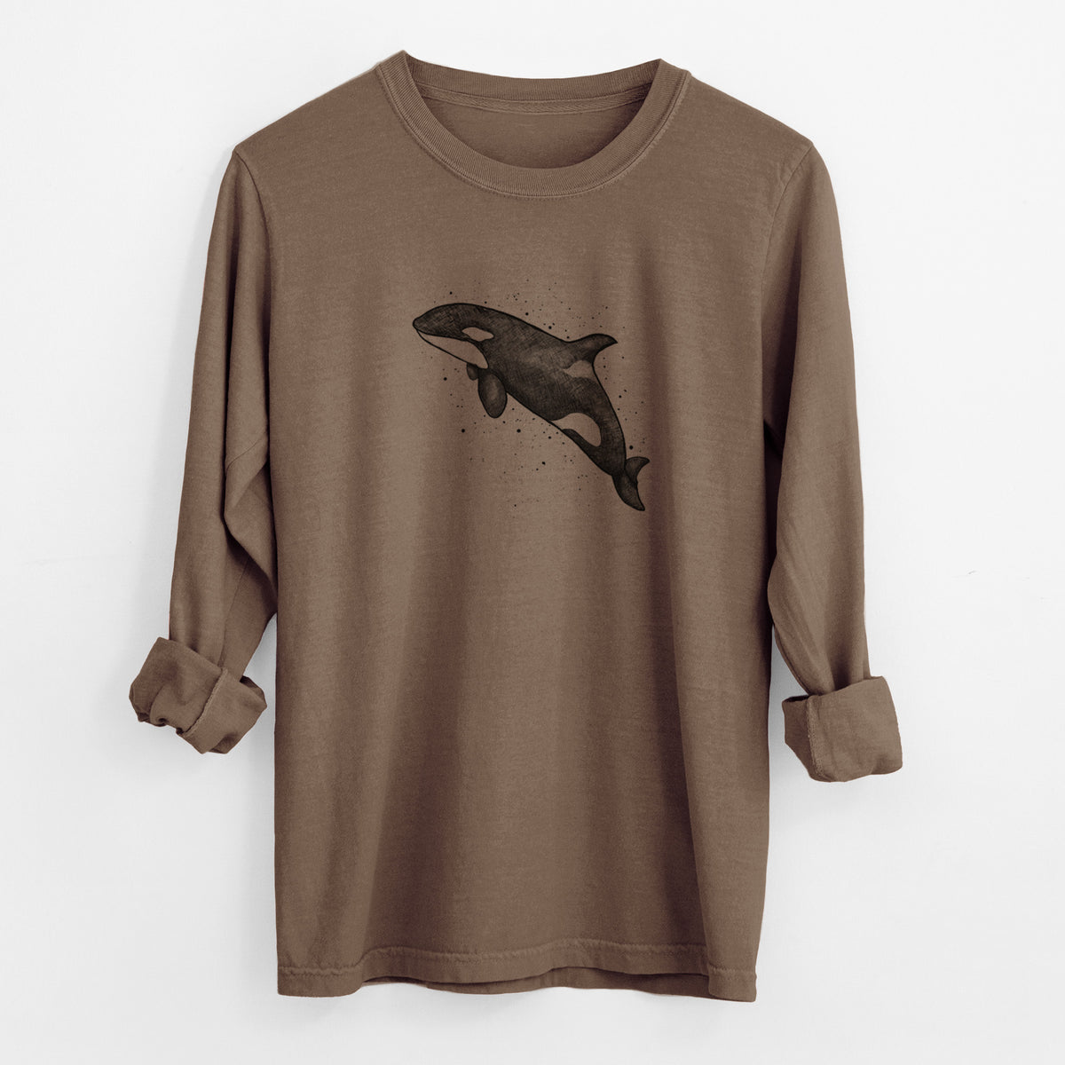 Espresso brown Comfort Colors long sleeve shirt laid flat with the cuffs rolled, printed with a black ink illustration of an orca leaping, with ink splatters.