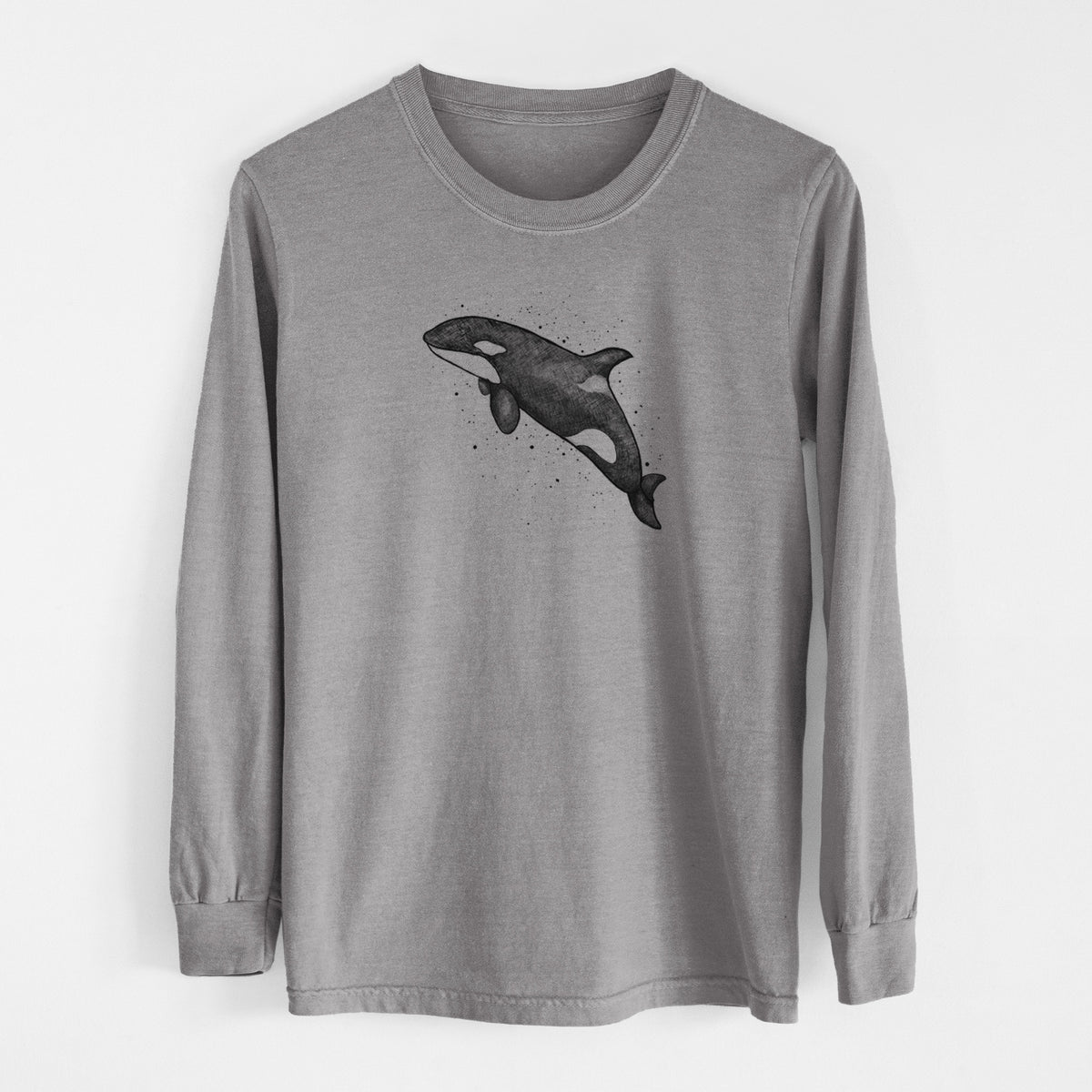 Grey Comfort Colors long sleeve shirt laid flat, printed with a black ink illustration of an orca leaping, with ink splatters.
