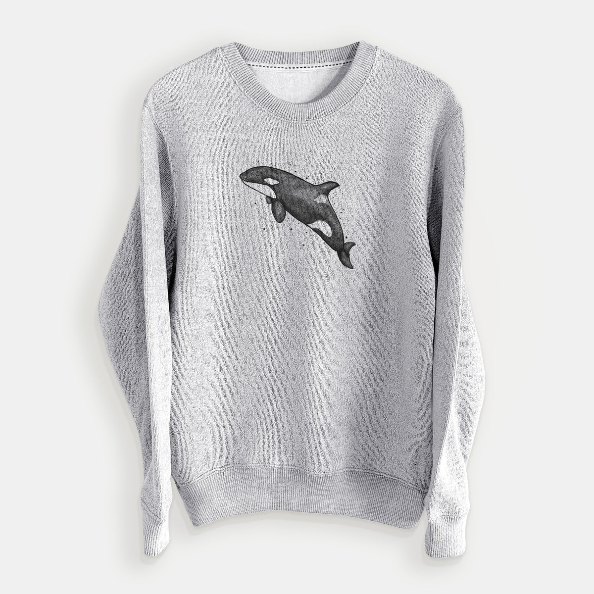 Salt and pepper knit sweatshirt laid flat, printed with a black ink illustration of an orca leaping, with ink splatters.