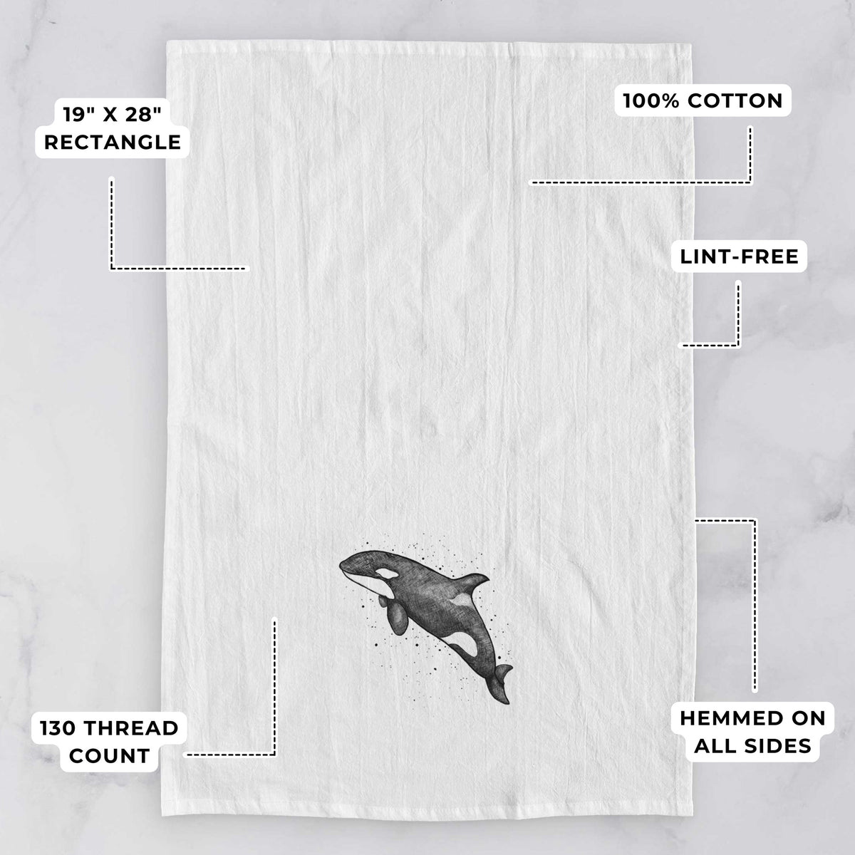 White tea towel printed with a black ink illustration of an orca leaping, with ink splatters, with feature labels: 19 by 28 inch rectangle, 100% cotton, lint-free, 130 thread count, hemmed on all sides.