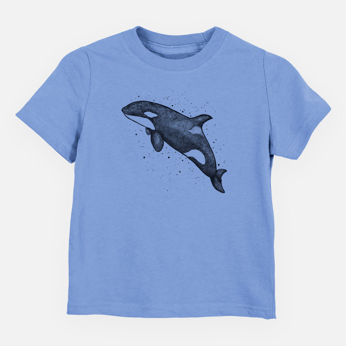 Carolina blue toddler t-shirt laid flat, printed with a black ink illustration of an orca leaping, with ink splatters.