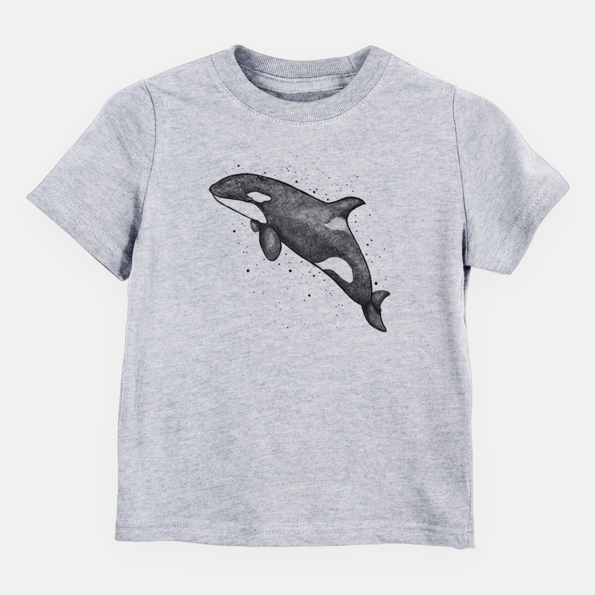 Heather grey toddler t-shirt laid flat, printed with a black ink illustration of an orca leaping, with ink splatters.