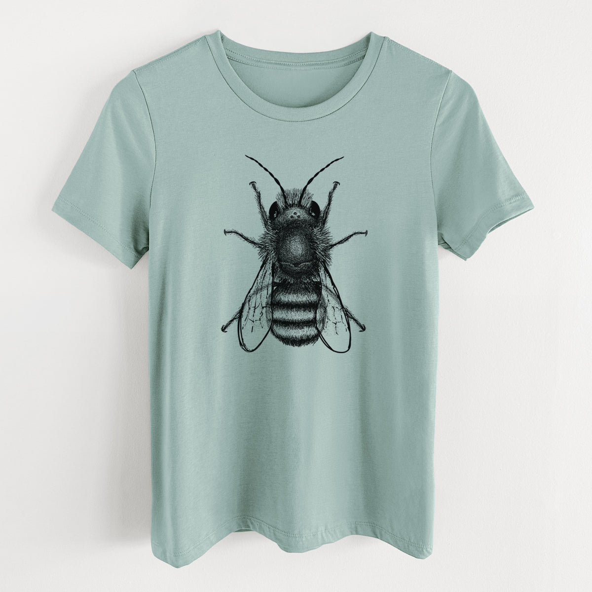 Dusty blue women's relaxed fit cotton t-shirt laid flat, printed with a detailed black ink illustration of a red mason bee with its wings spread, seen from above.