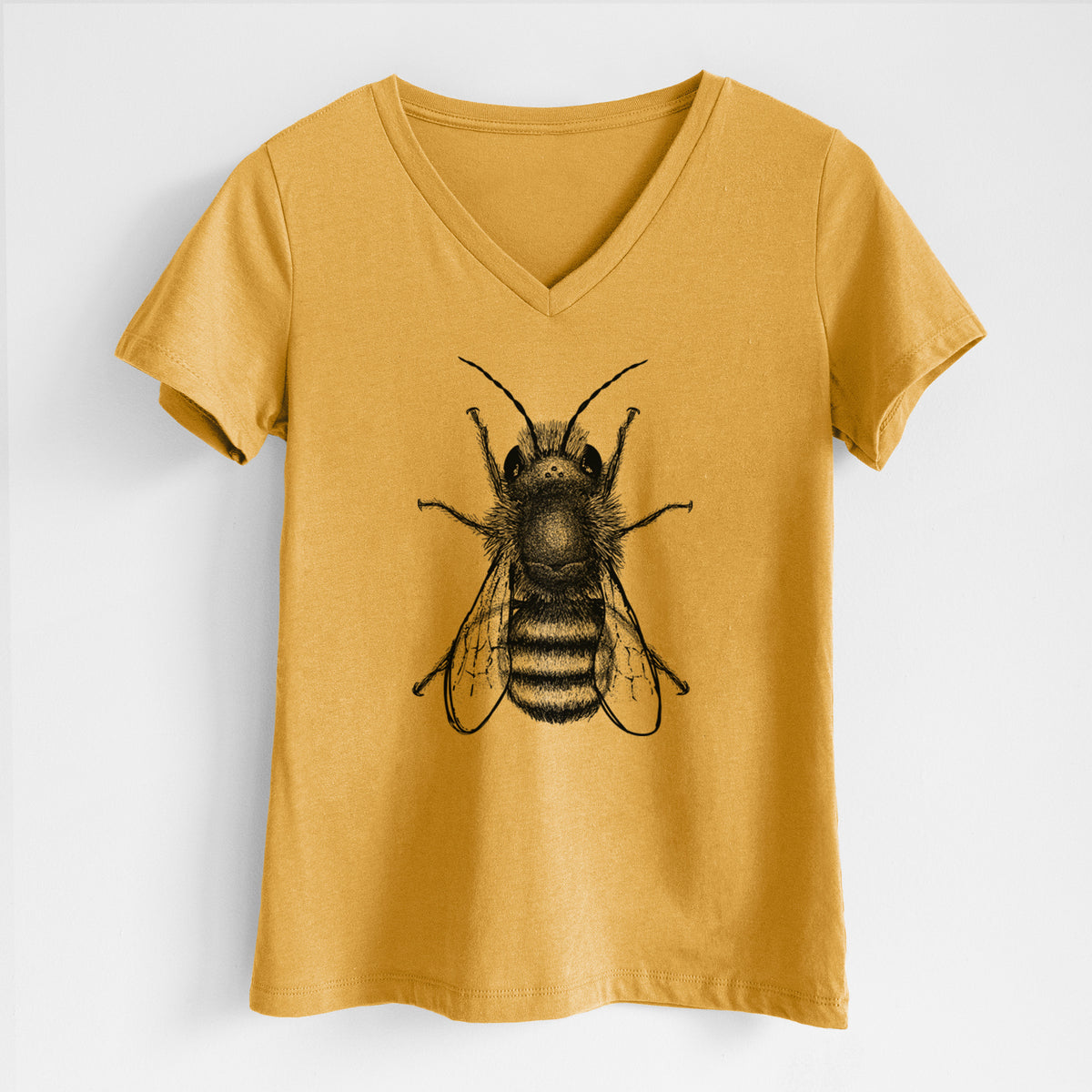 Honeycomb yellow women's relaxed fit cotton V-neck t-shirt laid flat, printed with a detailed black ink illustration of a red mason bee with its wings spread, seen from above.
