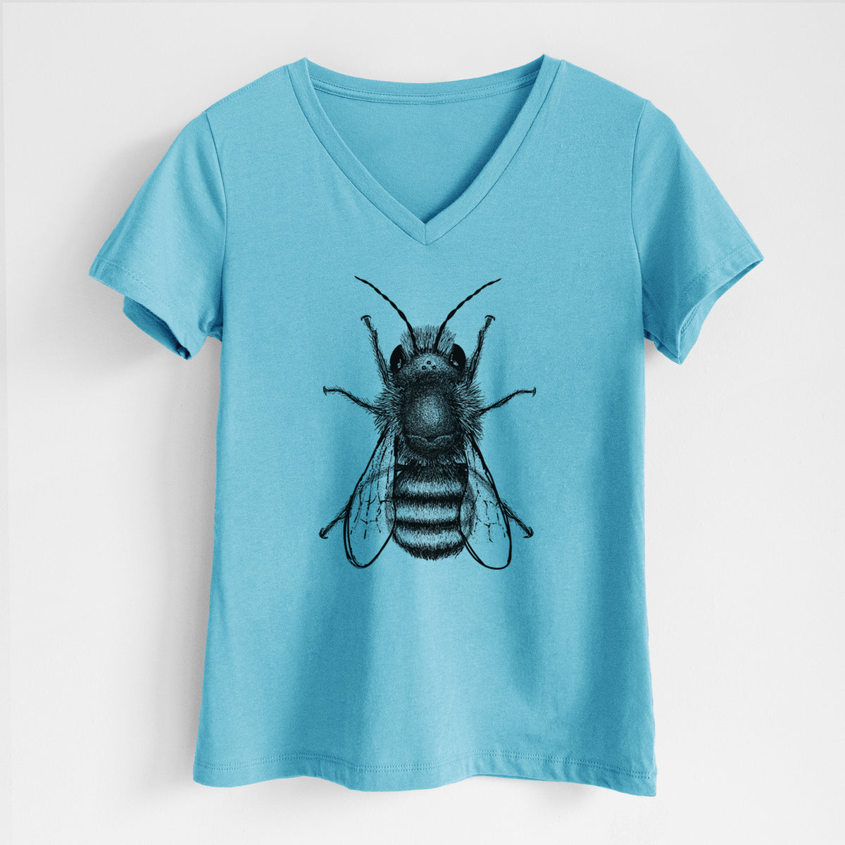 Turquoise women's relaxed fit cotton V-neck t-shirt laid flat, printed with a detailed black ink illustration of a red mason bee with its wings spread, seen from above.