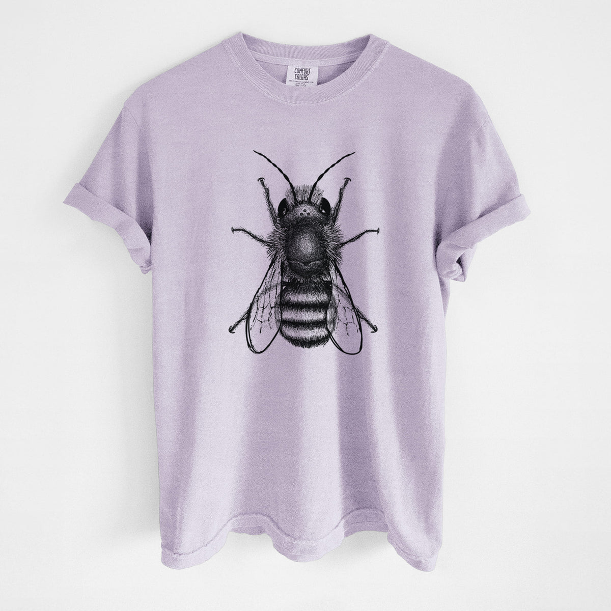 Orchid purple Comfort Colors t-shirt laid flat, printed with a detailed black ink illustration of a red mason bee with its wings spread, seen from above.