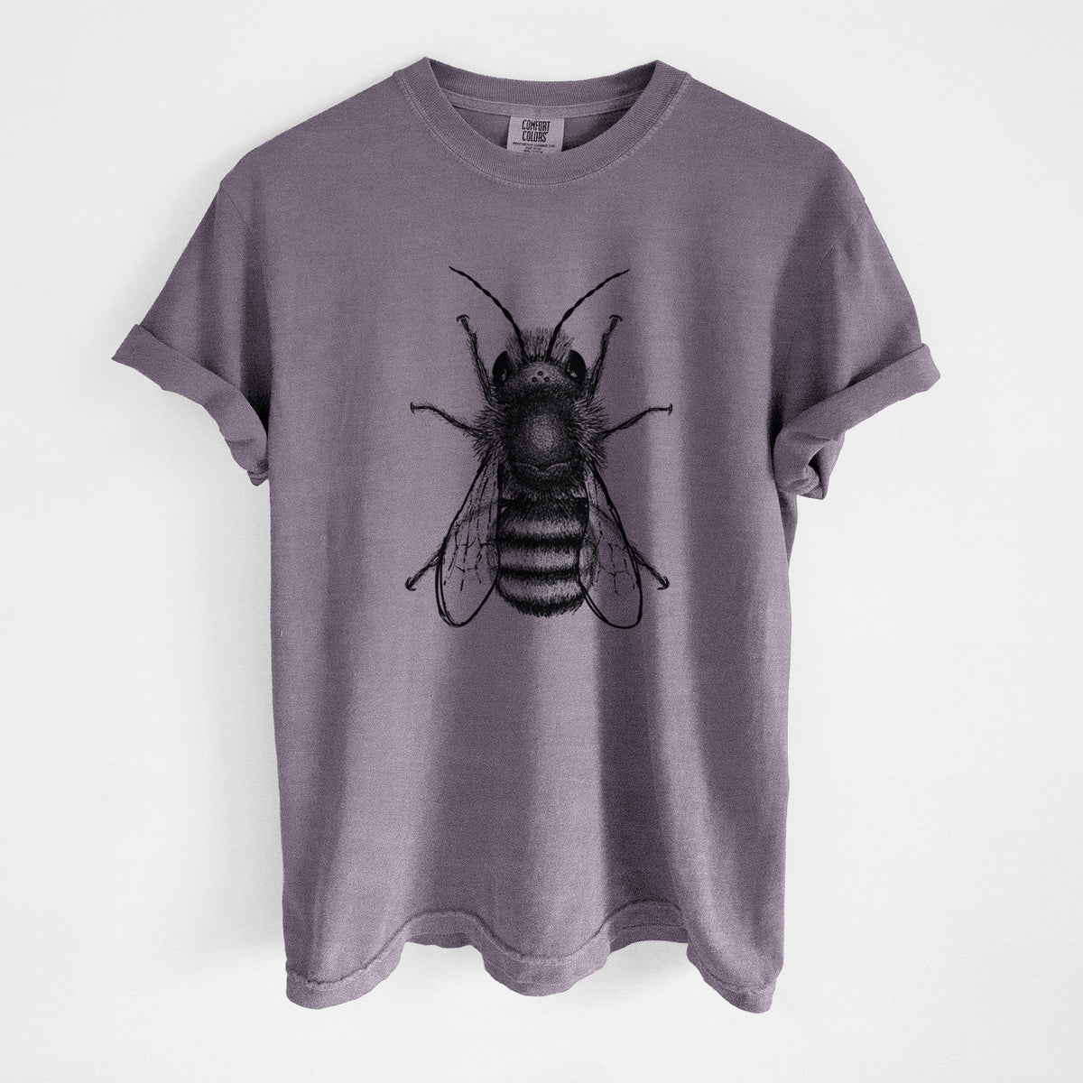 Wine red Comfort Colors t-shirt laid flat, printed with a detailed black ink illustration of a red mason bee with its wings spread, seen from above.