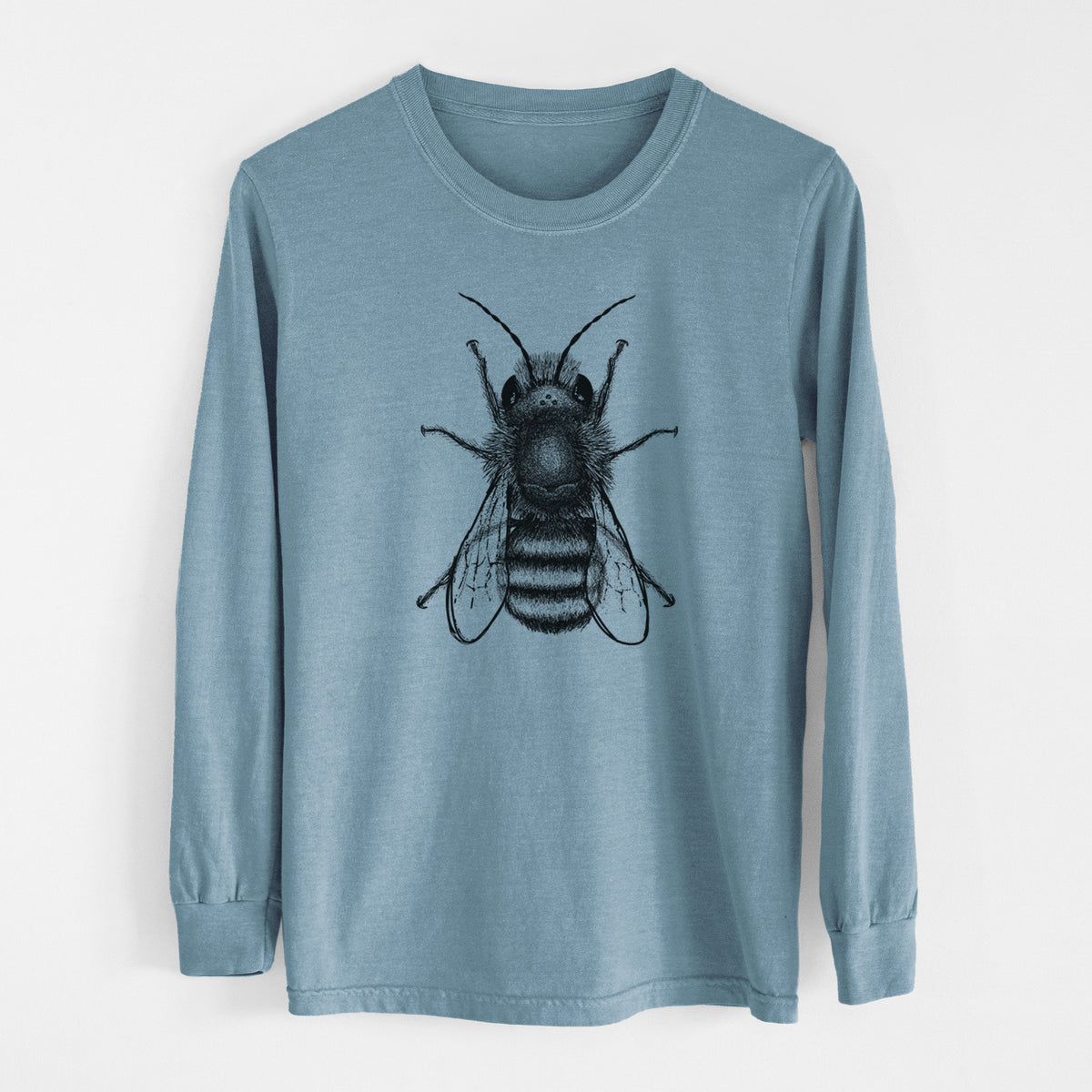 Steel blue Comfort Colors long sleeve shirt laid flat, printed with a detailed black ink illustration of a red mason bee with its wings spread, seen from above.