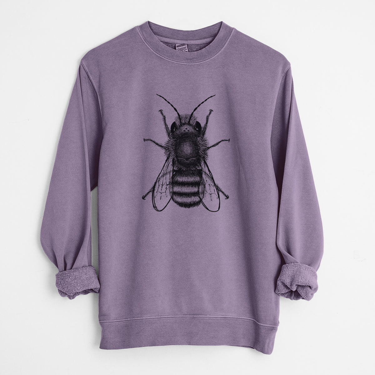 Plum purple pigment dyed crewneck sweatshirt laid flat with the sleeves rolled, printed with a detailed black ink illustration of a red mason bee with its wings spread, seen from above.