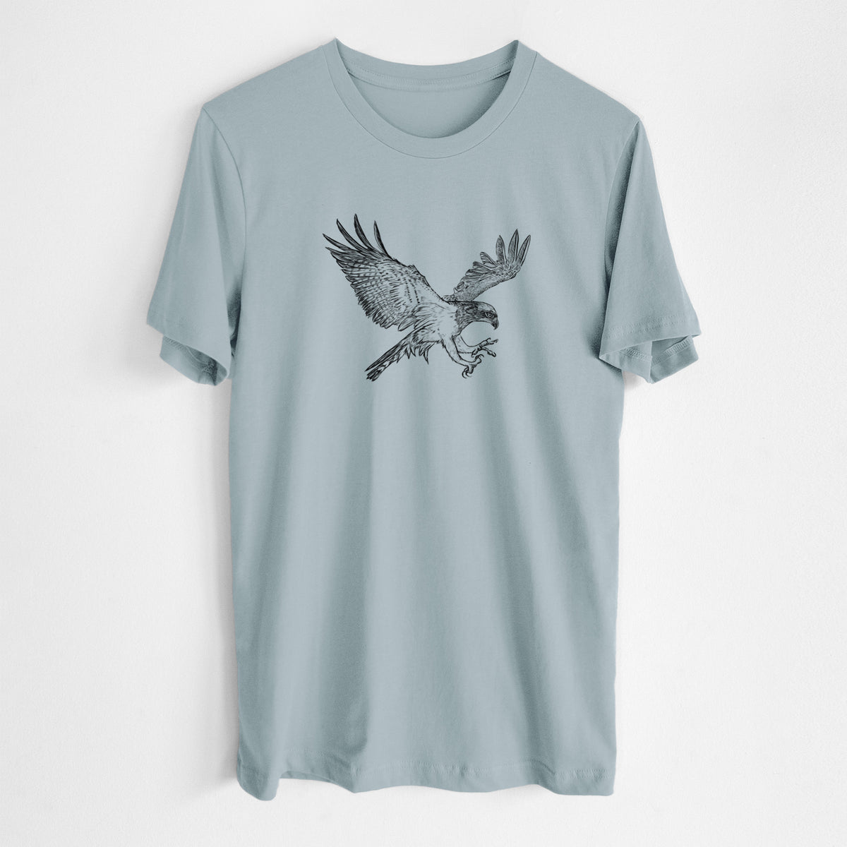 Vintage denim lightweight cotton t-shirt laid flat, printed with a black ink illustration of an osprey in flight with its wings spread.