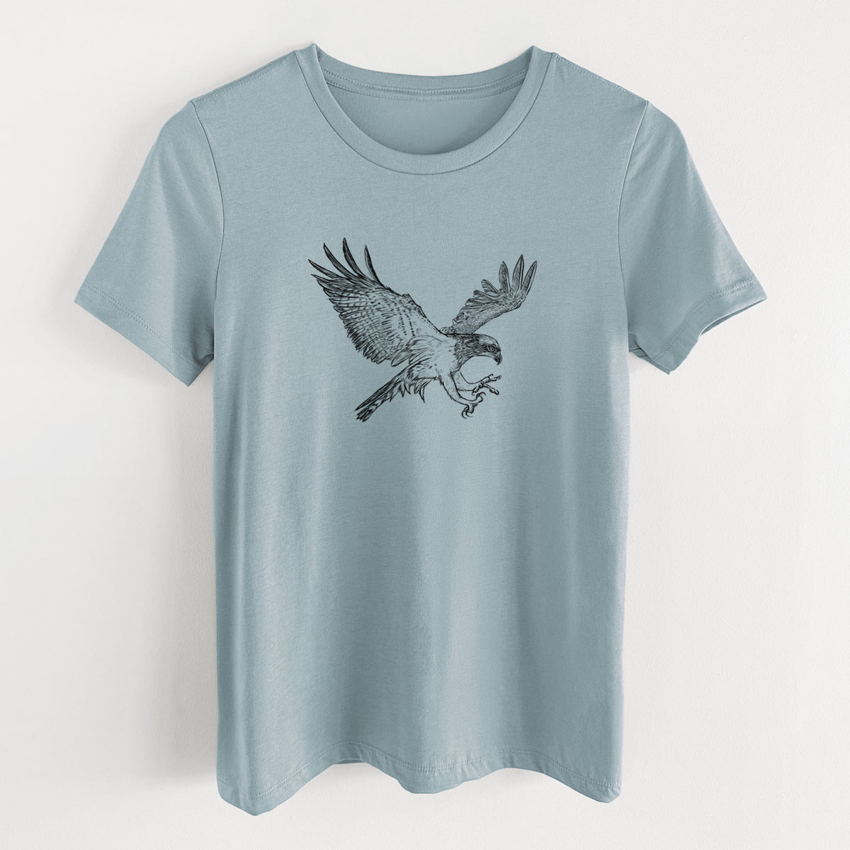 Vintage denim women's relaxed fit cotton t-shirt laid flat, printed with a black ink illustration of an osprey in flight with its wings spread.