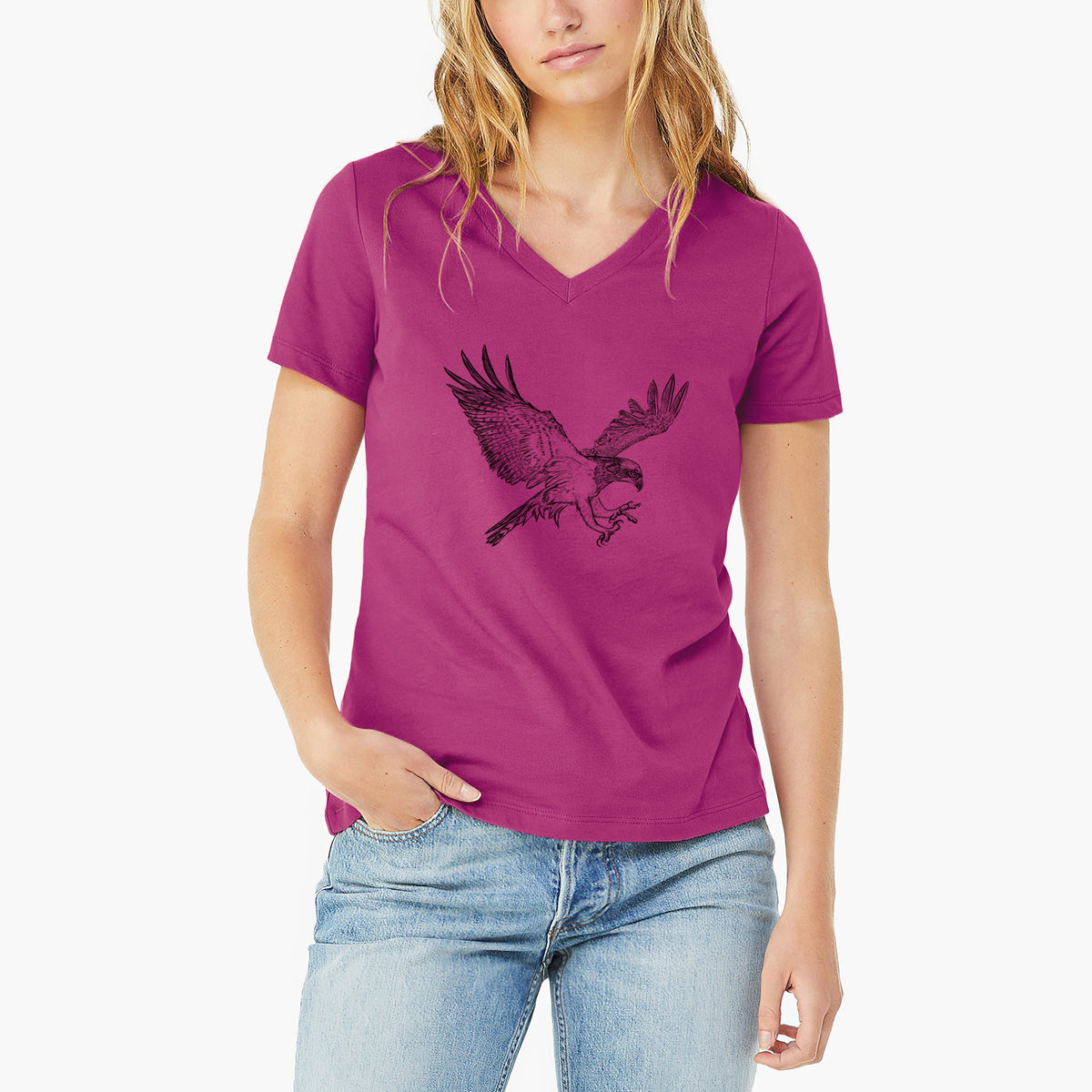 Woman wearing a berry pink women's relaxed fit cotton V-neck t-shirt printed with a black ink illustration of an osprey in flight with its wings spread.