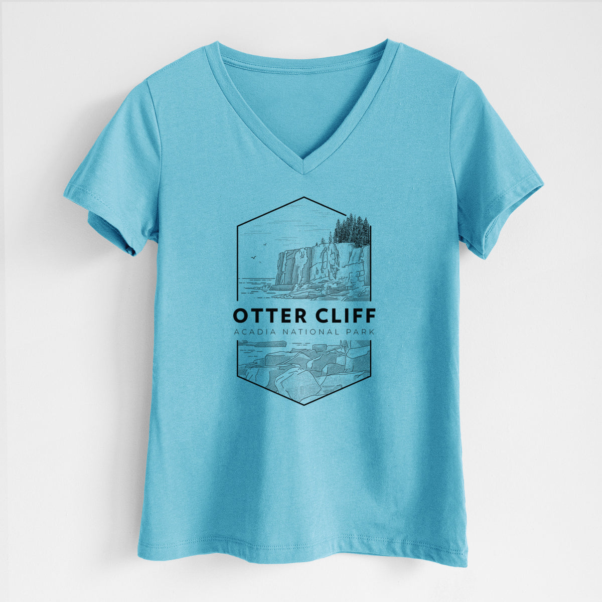 Turquoise women's relaxed fit cotton V-neck t-shirt laid flat, printed with a black line art badge of Otter Cliff above the ocean, with the words Otter Cliff, Acadia National Park.