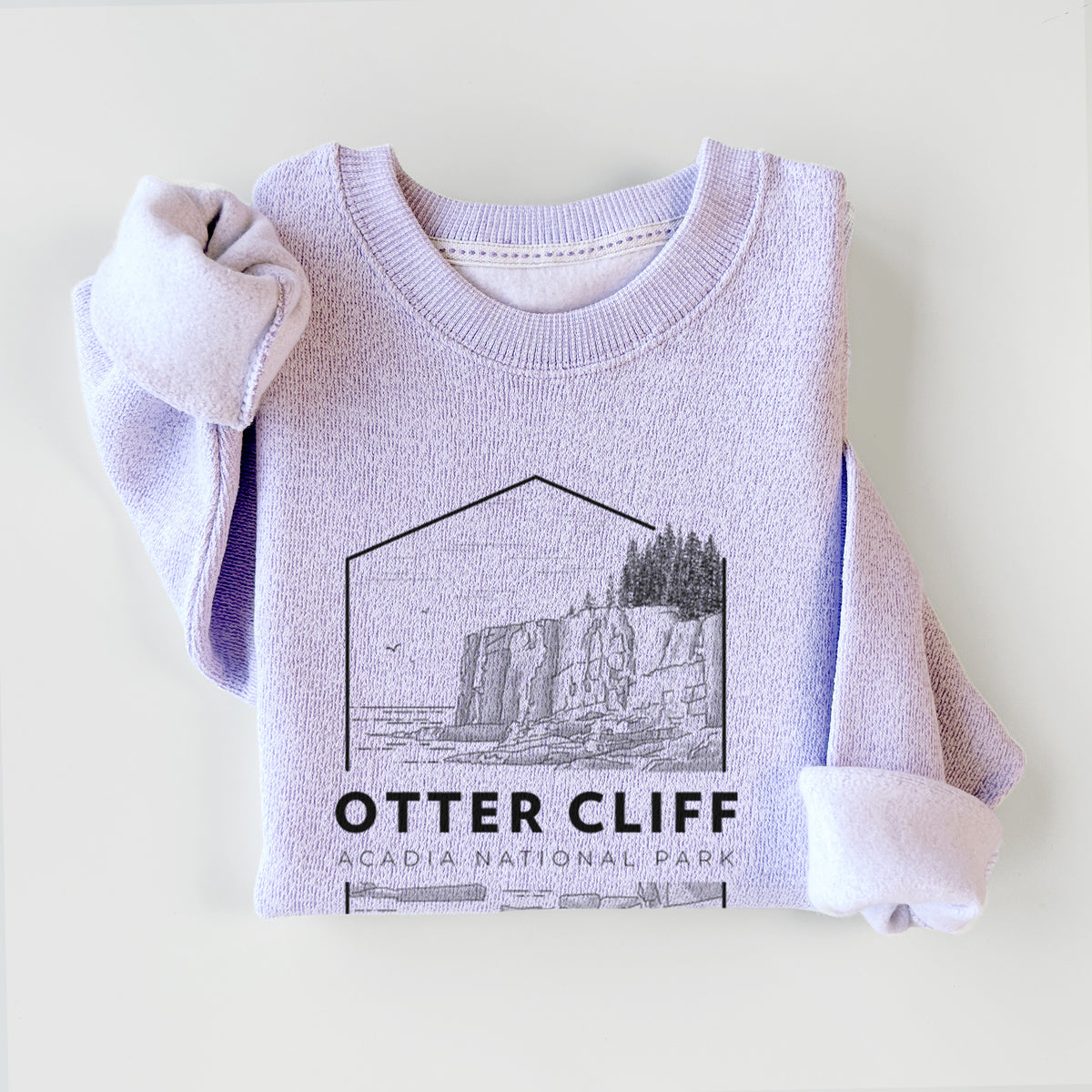 Ice purple knit sweatshirt printed with a black line art badge of Otter Cliff above the ocean, with the words Otter Cliff, Acadia National Park, styled flat.