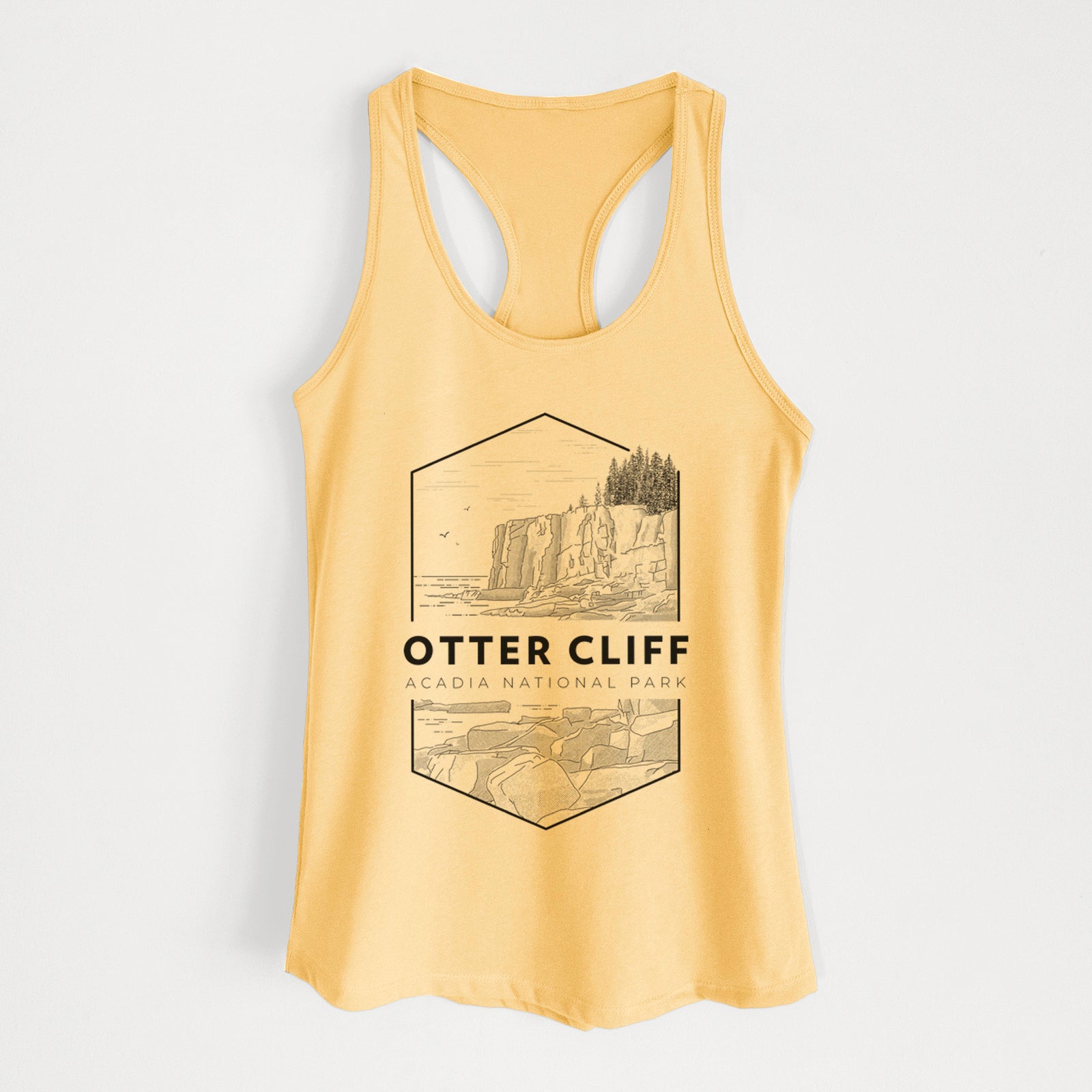 Banana cream women's racerback tank top laid flat, printed with a black line art badge of Otter Cliff above the ocean, with the words Otter Cliff, Acadia National Park.