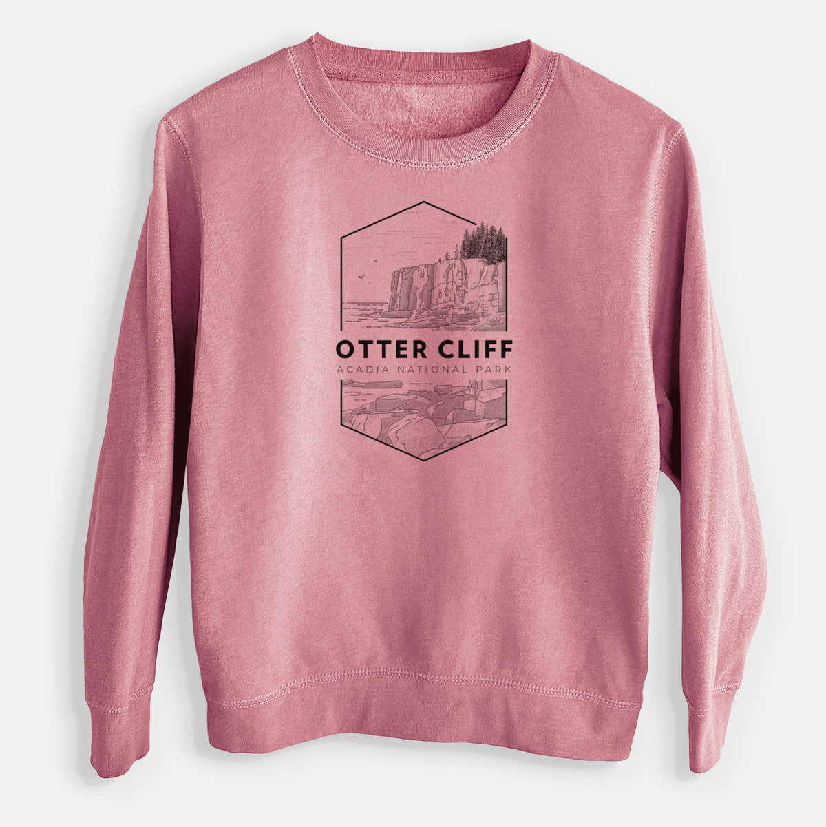 Mauve pink youth crewneck sweatshirt laid flat, printed with a black line art badge of Otter Cliff above the ocean, with the words Otter Cliff, Acadia National Park.