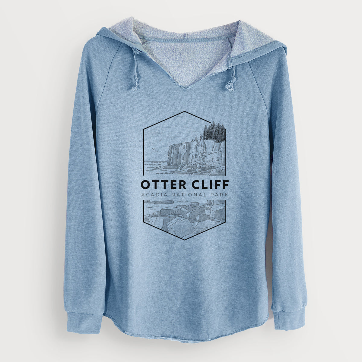 Misty blue women's Cali Wave hooded sweatshirt laid flat, printed with a black line art badge of Otter Cliff above the ocean, with the words Otter Cliff, Acadia National Park.