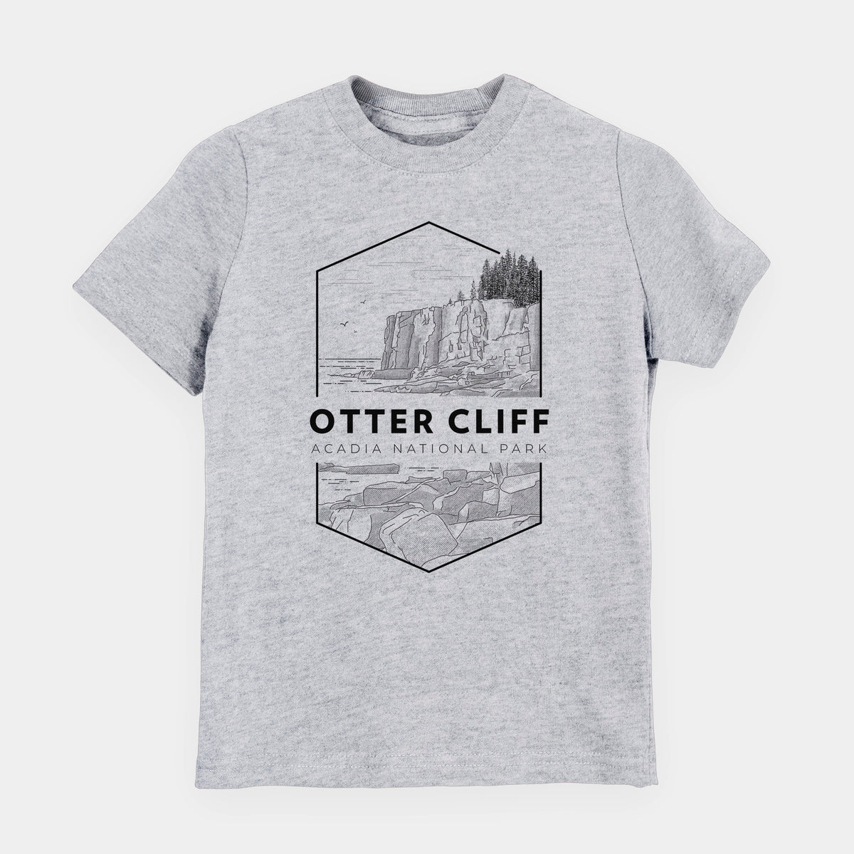 Heather grey youth t-shirt laid flat, printed with a black line art badge of Otter Cliff above the ocean, with the words Otter Cliff, Acadia National Park.