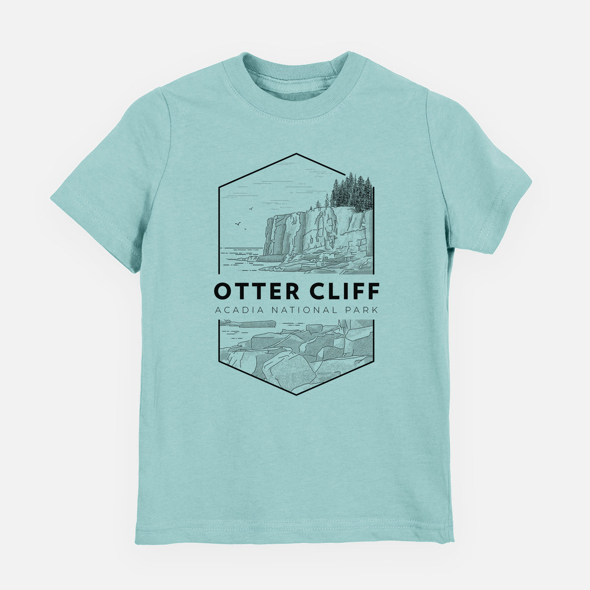 Saltwater youth t-shirt laid flat, printed with a black line art badge of Otter Cliff above the ocean, with the words Otter Cliff, Acadia National Park.