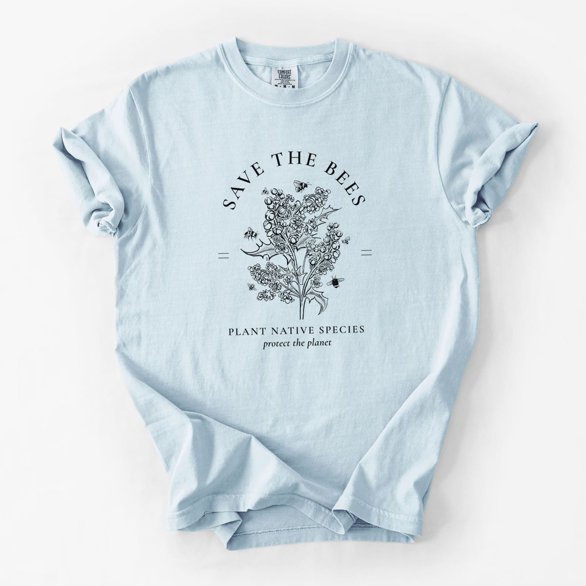 Chambray blue Comfort Colors t-shirt laid flat, printed with a black ink wildflower bouquet with bees, framed by the words Save the Bees, Plant Native Species.