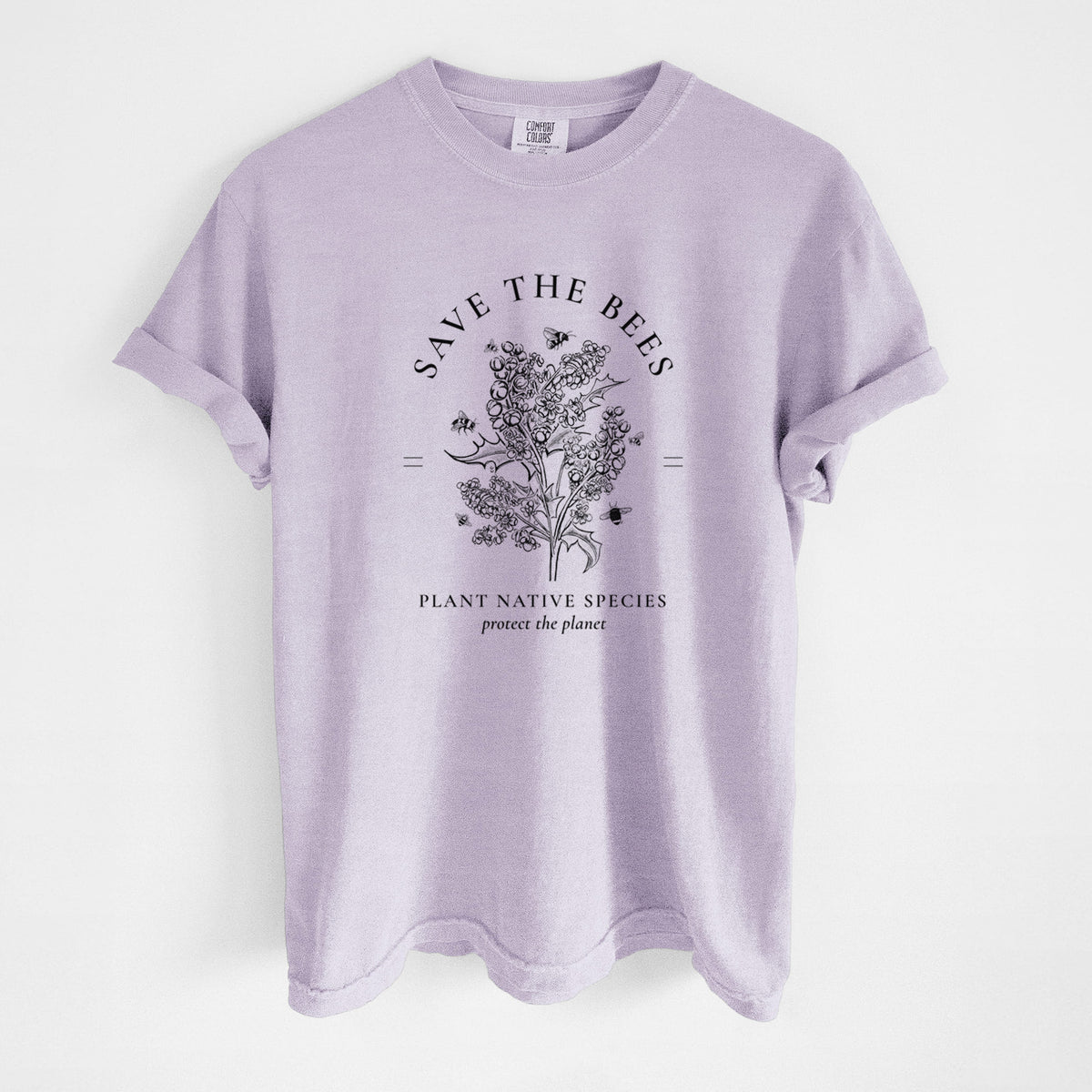 Orchid purple Comfort Colors t-shirt laid flat, printed with a black ink wildflower bouquet with bees, framed by the words Save the Bees, Plant Native Species.