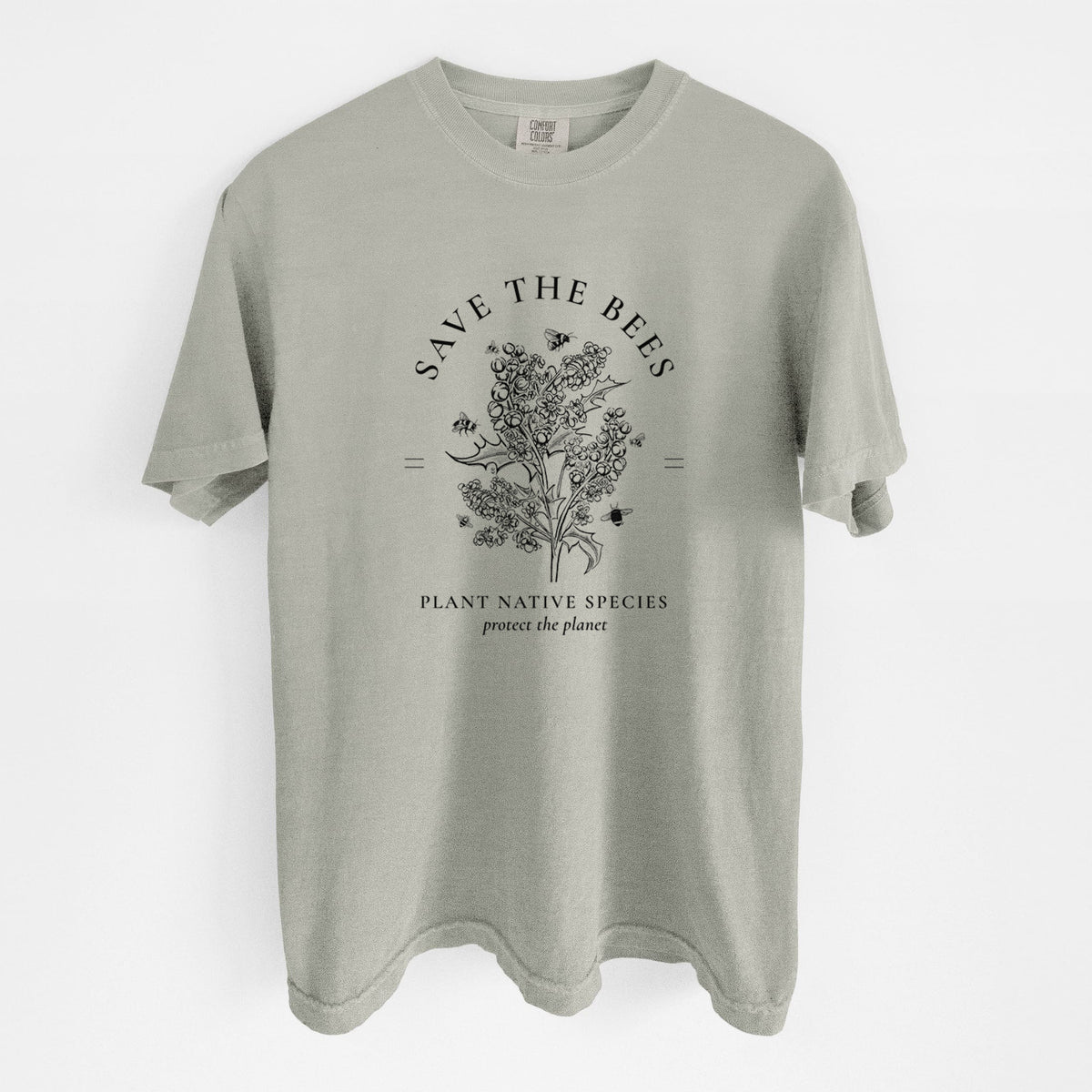 Sandstone beige Comfort Colors t-shirt laid flat, printed with a black ink wildflower bouquet with bees, framed by the words Save the Bees, Plant Native Species.