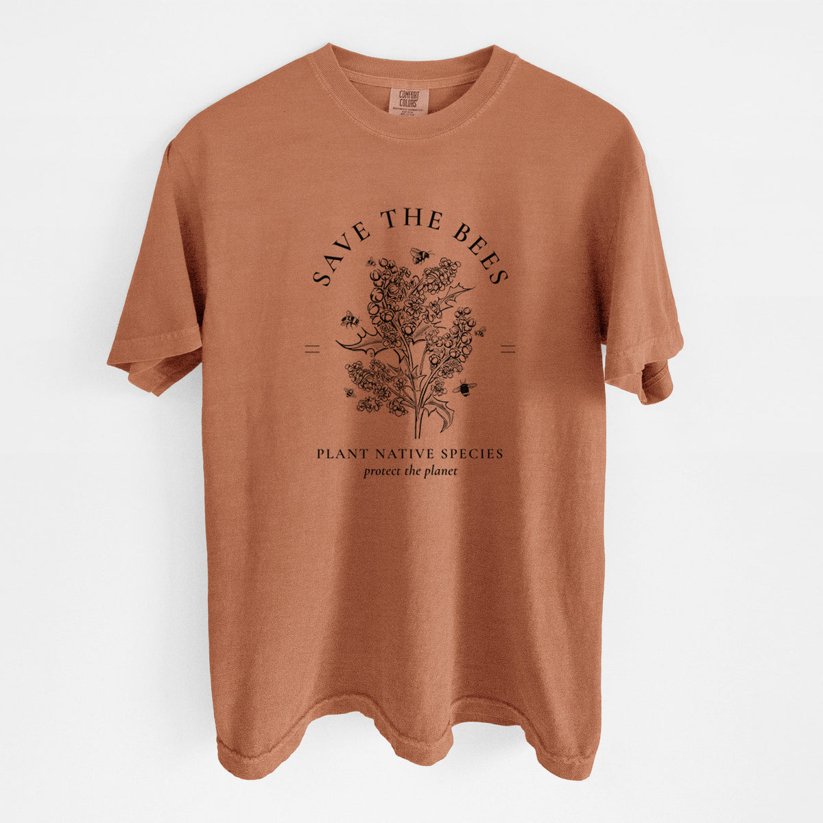 Yam burnt orange Comfort Colors t-shirt laid flat, printed with a black ink wildflower bouquet with bees, framed by the words Save the Bees, Plant Native Species.