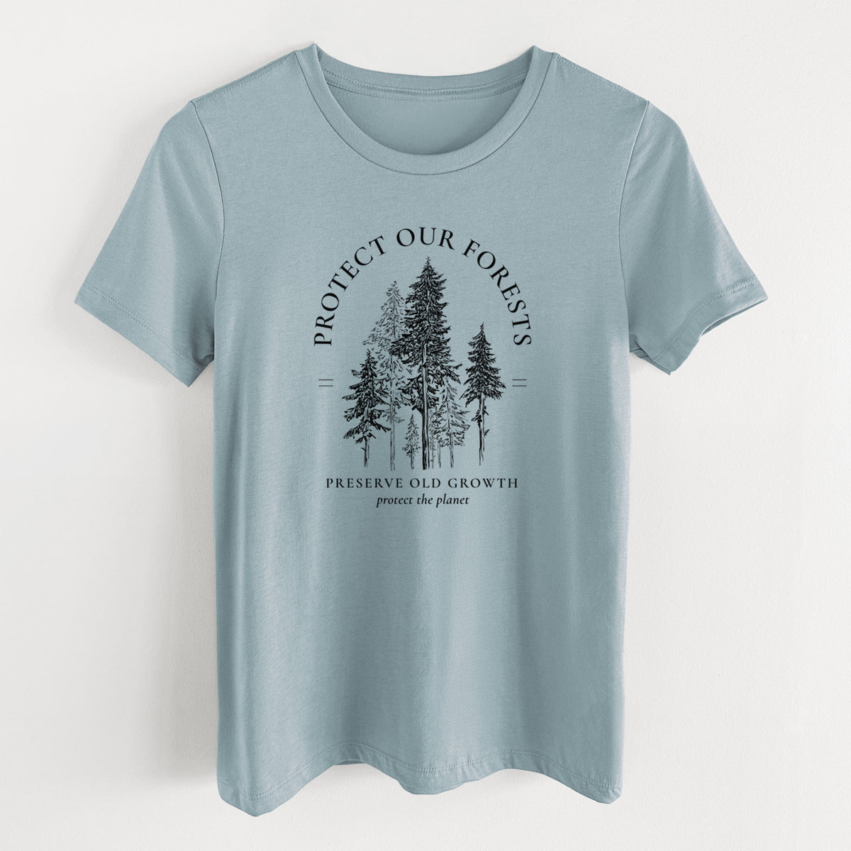 Vintage denim women's relaxed fit cotton t-shirt laid flat, printed with a black ink illustration of a stand of tall pine trees, framed by the words Protect Our Forests, Preserve Old Growth.